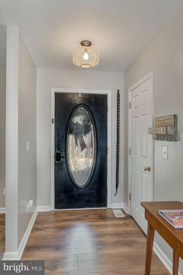 19446 Heather Ln, Orange, VA 22960 - foyer entrance with wood finished floors and baseboards