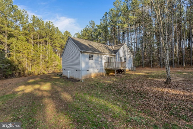 19446 Heather Ln, Orange, VA 22960 - view of property exterior featuring crawl space, a wooden deck, central air condition unit, and a forest view