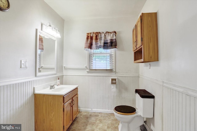 526 N 3rd St, Wormleysburg, PA 17043 - bathroom featuring toilet, wainscoting, and vanity