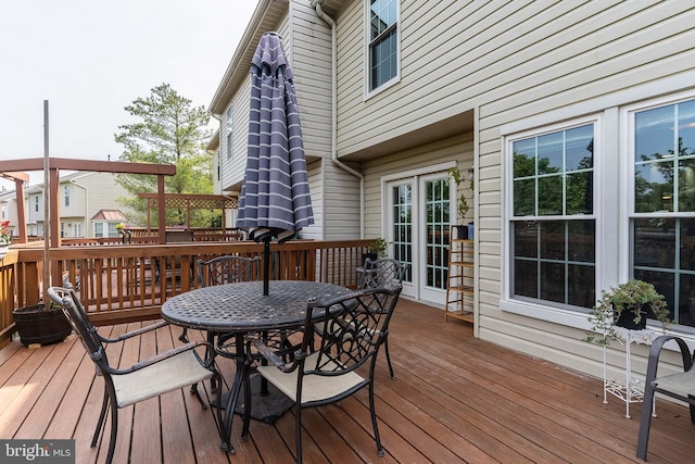 21008 Strawrick Ter, Ashburn, VA 20147 - wooden terrace with outdoor dining area
