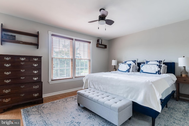 21008 Strawrick Ter, Ashburn, VA 20147 - bedroom featuring baseboards, wood finished floors, and a ceiling fan