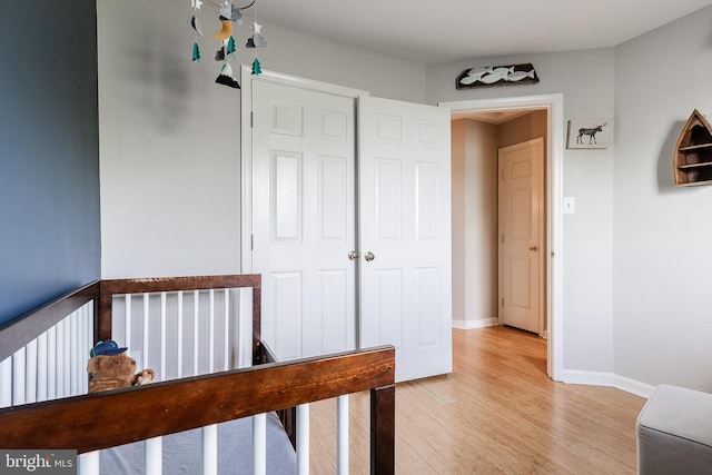 21008 Strawrick Ter, Ashburn, VA 20147 - hallway with light wood-type flooring and baseboards