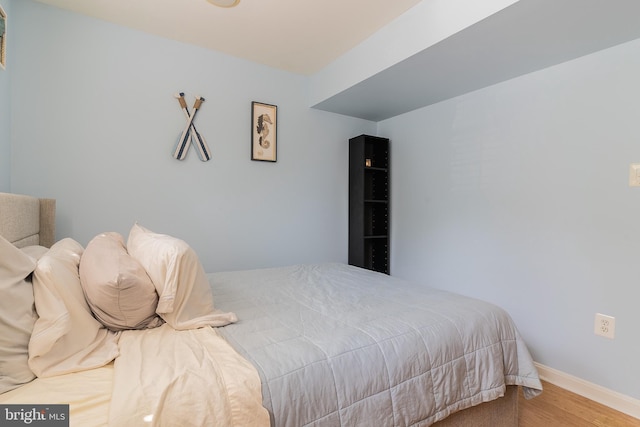 21008 Strawrick Ter, Ashburn, VA 20147 - bedroom featuring wood finished floors and baseboards