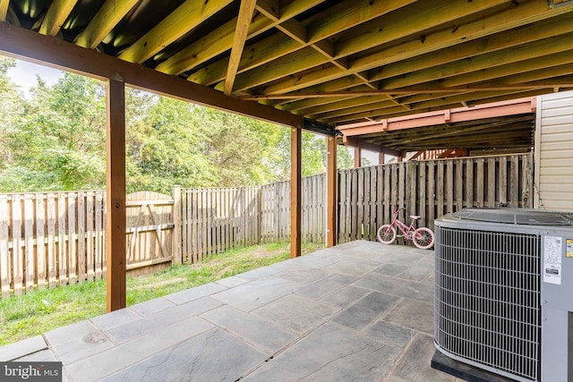 21008 Strawrick Ter, Ashburn, VA 20147 - fenced backyard with central air condition unit and a patio area