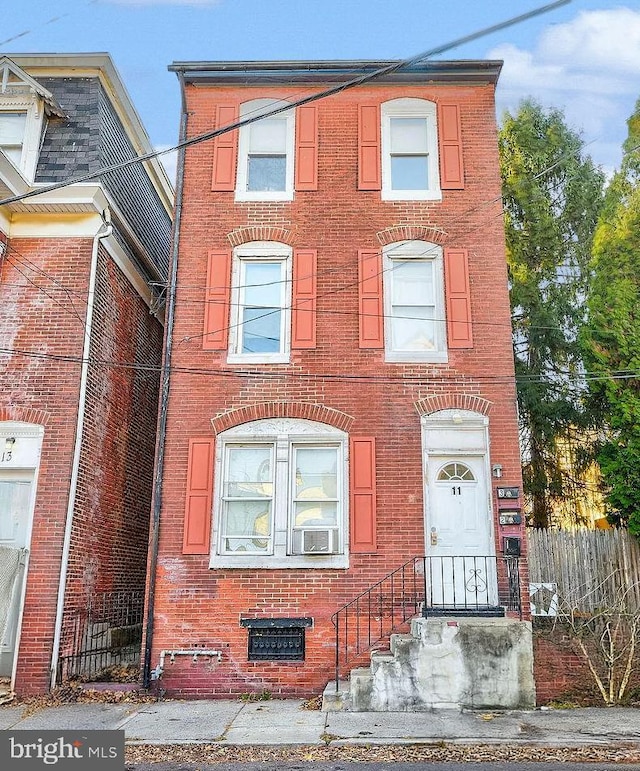 11 S Franklin St, Pottstown, PA 19464 - view of front of property with brick siding and cooling unit