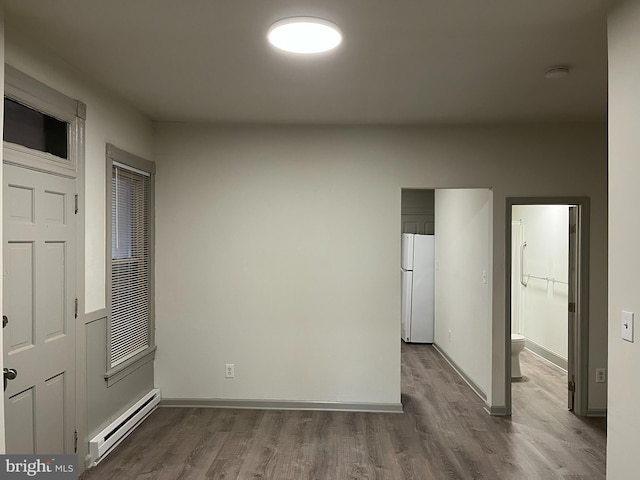 11 S Franklin St, Pottstown, PA 19464 - spare room with baseboard heating, wood finished floors, baseboards, and a smoke detector