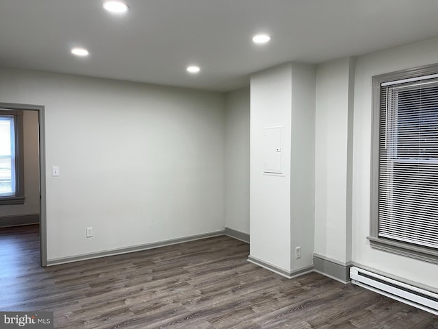11 S Franklin St, Pottstown, PA 19464 - empty room with recessed lighting, wood finished floors, a baseboard heating unit, and baseboards
