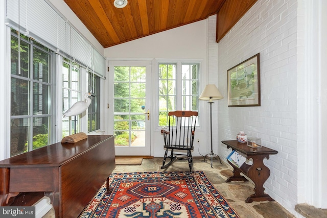 114 Bellemore Rd, Baltimore, MD 21210 - living area with wooden ceiling, lofted ceiling, and brick wall