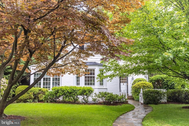 114 Bellemore Rd, Baltimore, MD 21210 - obstructed view of property with a front lawn