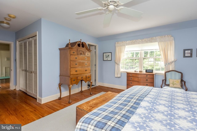 114 Bellemore Rd, Baltimore, MD 21210 - bedroom featuring wood finished floors, baseboards, a closet, and ceiling fan