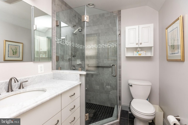 114 Bellemore Rd, Baltimore, MD 21210 - bathroom with toilet, vanity, a stall shower, and tile patterned flooring