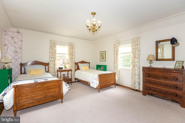 114 Bellemore Rd, Baltimore, MD 21210 - bedroom with a chandelier, carpet, lofted ceiling, and baseboards