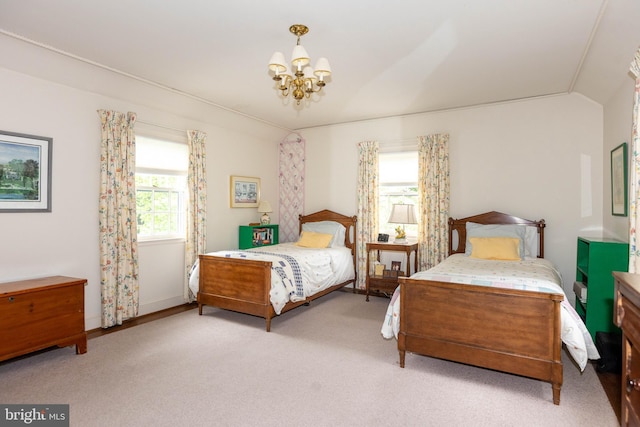 114 Bellemore Rd, Baltimore, MD 21210 - bedroom with a chandelier and carpet floors