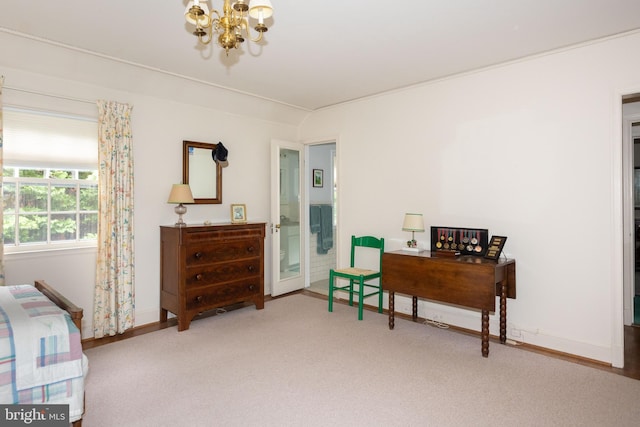 114 Bellemore Rd, Baltimore, MD 21210 - bedroom featuring a chandelier, carpet flooring, and baseboards