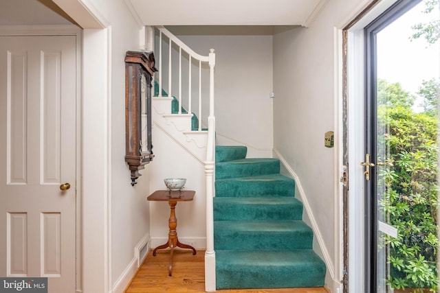 114 Bellemore Rd, Baltimore, MD 21210 - stairway with wood finished floors and baseboards
