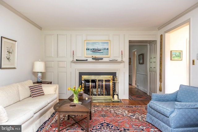 114 Bellemore Rd, Baltimore, MD 21210 - living area with crown molding, a glass covered fireplace, and wood finished floors