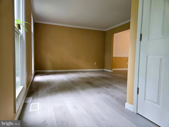 10920 Oakcrest Cir, New Market, MD 21774 - unfurnished room featuring wood finished floors, crown molding, baseboards, and healthy amount of natural light