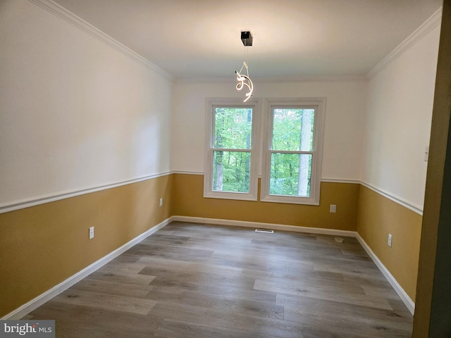 10920 Oakcrest Cir, New Market, MD 21774 - spare room with wood finished floors, ornamental molding, and baseboards