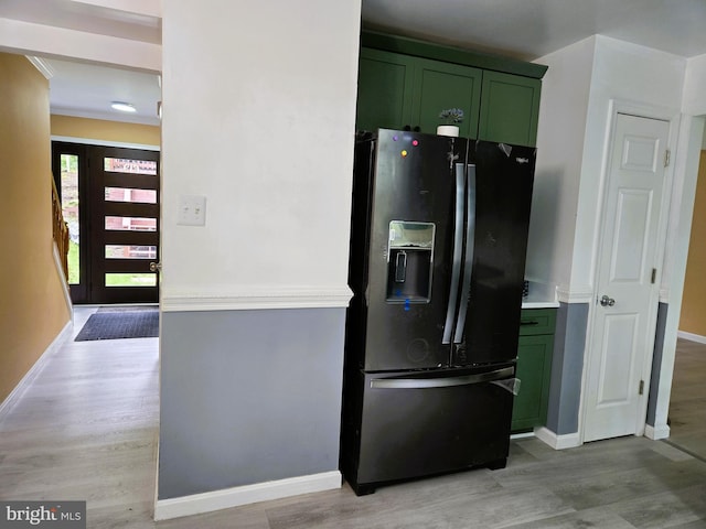 10920 Oakcrest Cir, New Market, MD 21774 - kitchen featuring green cabinetry, black fridge with ice dispenser, light wood-type flooring, and baseboards