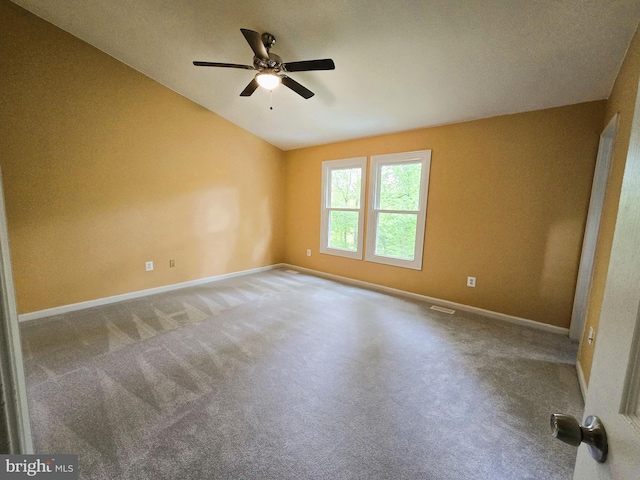 10920 Oakcrest Cir, New Market, MD 21774 - spare room featuring vaulted ceiling, ceiling fan, baseboards, and carpet flooring