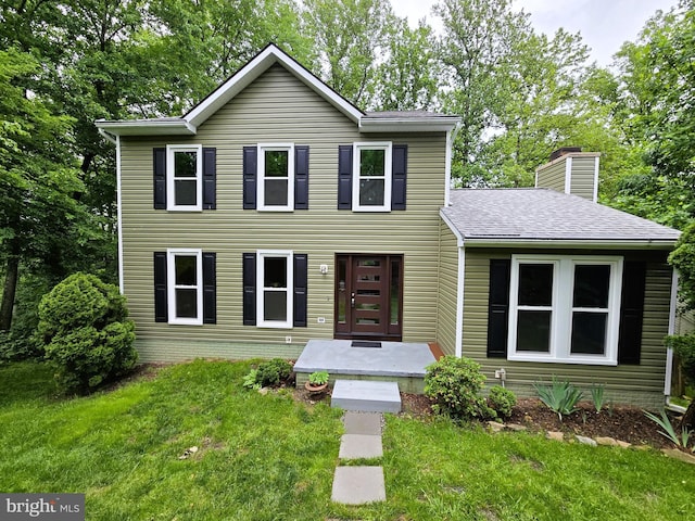 10920 Oakcrest Cir, New Market, MD 21774 - view of front of house with a chimney, a front yard, and a shingled roof