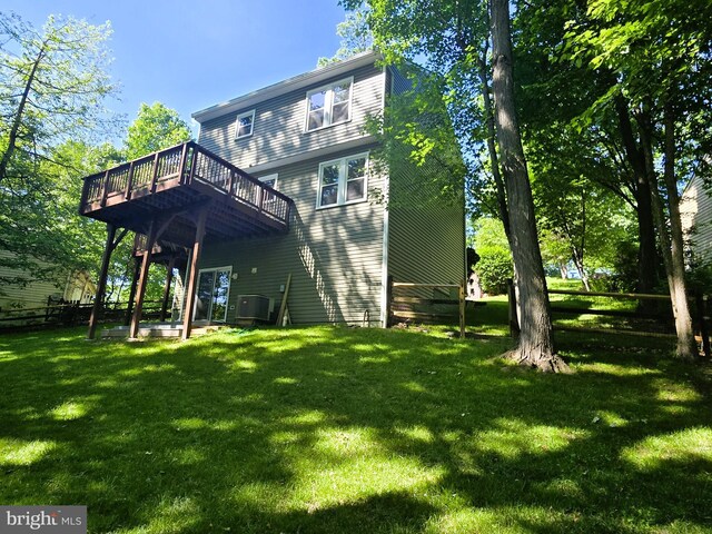10920 Oakcrest Cir, New Market, MD 21774 - rear view of property with a wooden deck, a yard, and central AC unit