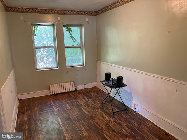 4832 N Sydenham St, Philadelphia, PA 19141 - empty room with radiator heating unit, wood finished floors, and baseboards