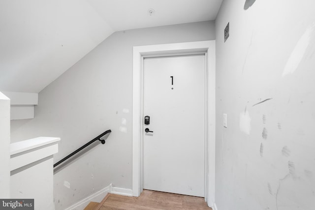 2639 Cecil B Moore Ave, Philadelphia, PA 19121 - stairway featuring wood finished floors and vaulted ceiling