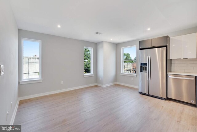 2639 Cecil B Moore Ave, Philadelphia, PA 19121 - kitchen with stainless steel appliances, healthy amount of natural light, light wood-style floors, and recessed lighting
