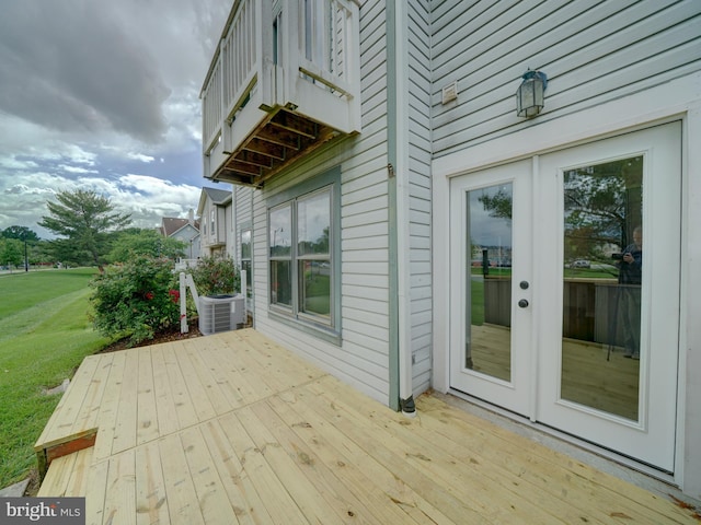 9309 Player Dr Unit 116, Laurel, MD 20708 - wooden deck featuring french doors, a lawn, and central air condition unit
