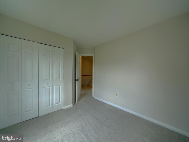 9309 Player Dr Unit 116, Laurel, MD 20708 - unfurnished bedroom with carpet floors, baseboards, and a closet