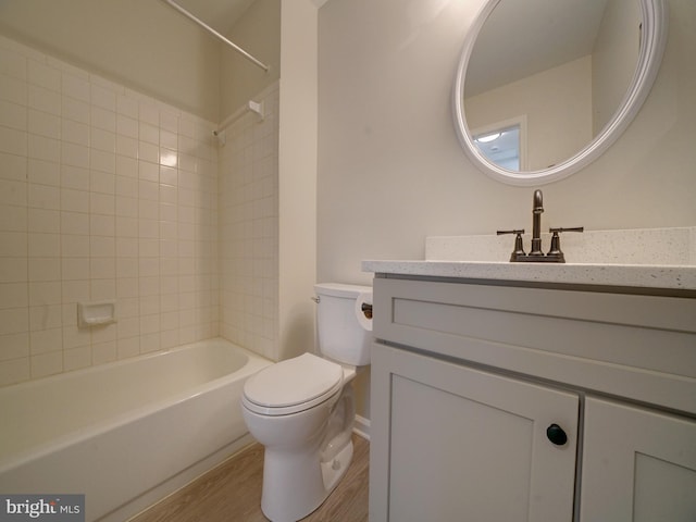 9309 Player Dr Unit 116, Laurel, MD 20708 - bathroom featuring wood finished floors, vanity, toilet, and shower / bath combination