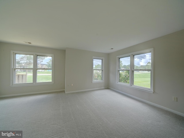 9309 Player Dr Unit 116, Laurel, MD 20708 - unfurnished room featuring plenty of natural light, baseboards, and carpet floors