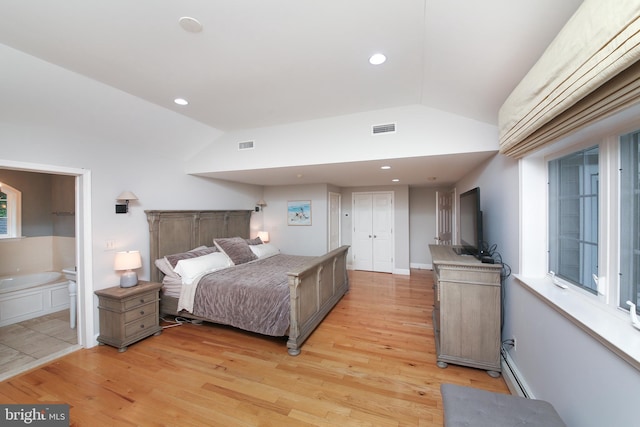 3195 Pelham Pl, Doylestown, PA 18902 - bedroom with vaulted ceiling, light wood finished floors, a baseboard heating unit, recessed lighting, and ensuite bath