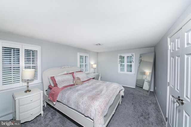 3195 Pelham Pl, Doylestown, PA 18902 - bedroom with dark carpet, a baseboard radiator, and baseboards