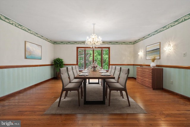 10060 Hampton Rd, Fairfax Station, VA 22039 - dining area with a chandelier and wood-type flooring