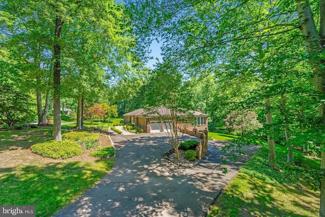 10060 Hampton Rd, Fairfax Station, VA 22039 - view of front of property with driveway and an attached garage