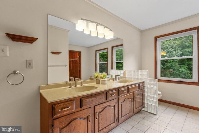 10060 Hampton Rd, Fairfax Station, VA 22039 - bathroom with plenty of natural light, double vanity, crown molding, and tile patterned floors