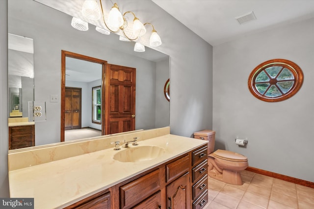 10060 Hampton Rd, Fairfax Station, VA 22039 - bathroom with vanity, tile patterned floors, and a chandelier