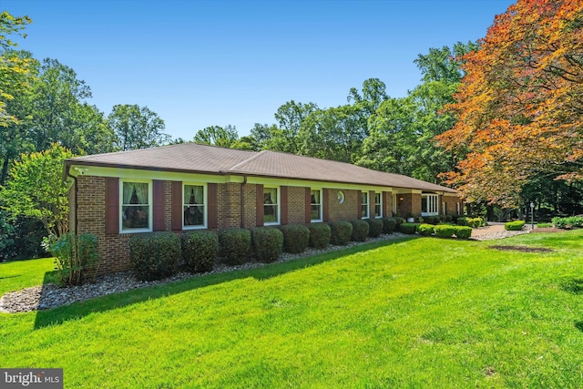 10060 Hampton Rd, Fairfax Station, VA 22039 - ranch-style home with a front lawn and brick siding
