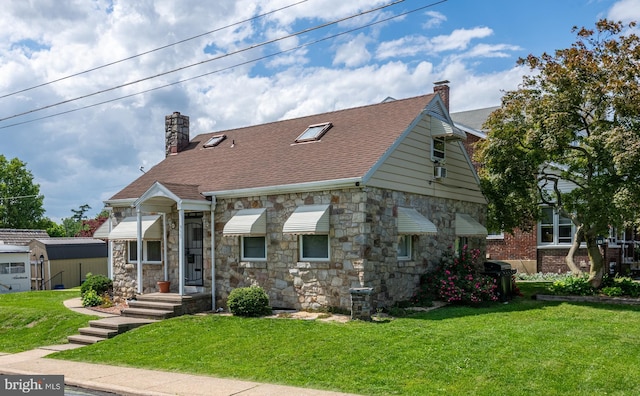935 Grove St, Reading, PA 19605 - view of front facade featuring a chimney, stone siding, a front lawn, and a shingled roof