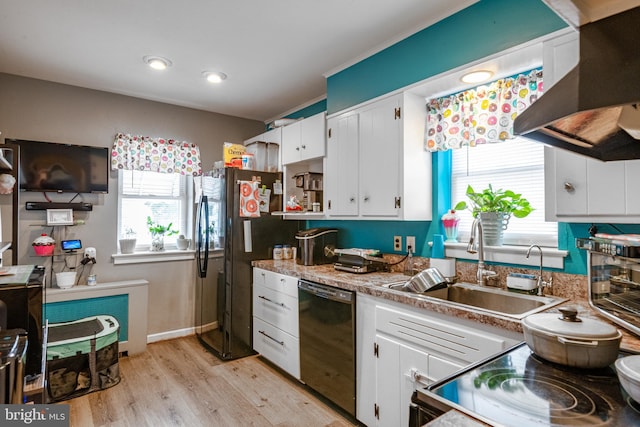 935 Grove St, Reading, PA 19605 - kitchen featuring black appliances, extractor fan, a sink, healthy amount of natural light, and recessed lighting