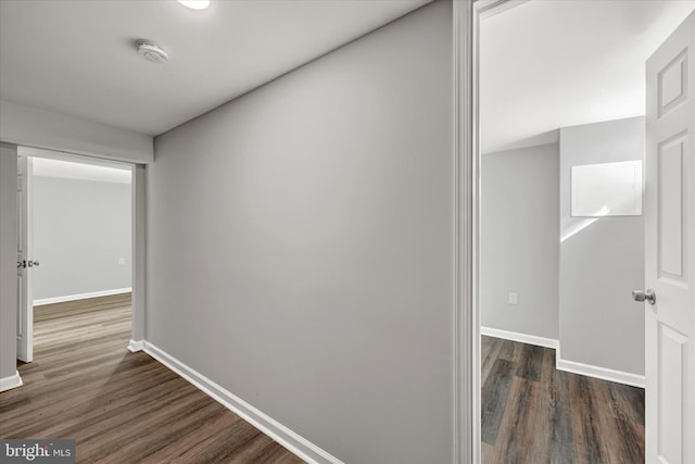 1076 Tunbridge Rd, Baltimore, MD 21212 - hallway with dark wood-style floors and baseboards