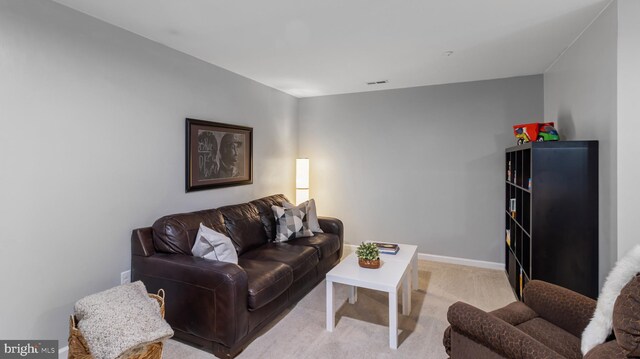 661 Claiborne Road, North East, MD 21901 - living room featuring light colored carpet and baseboards