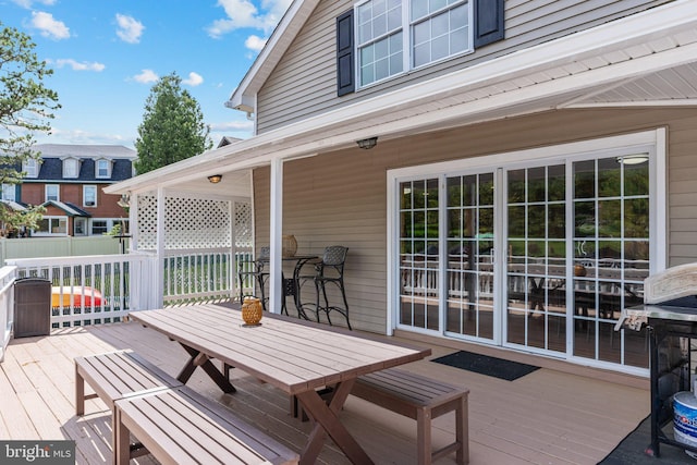 34 S Lake Dr, Lake Harmony, PA 18624 - wooden terrace with outdoor dining area and a grill