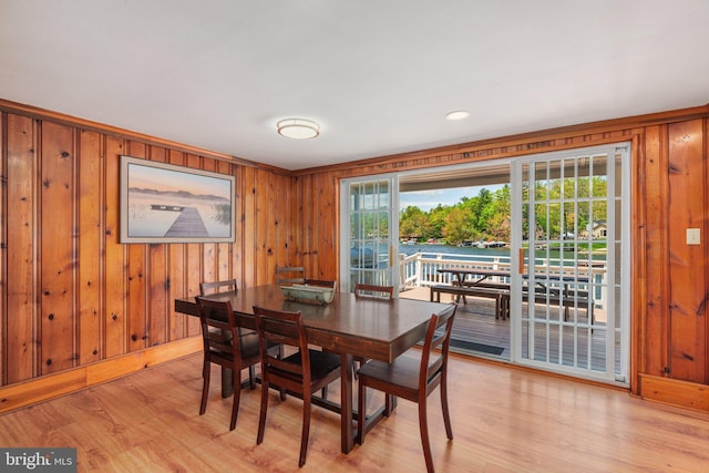 34 S Lake Dr, Lake Harmony, PA 18624 - dining space featuring wooden walls, light wood-style floors, plenty of natural light, and baseboards
