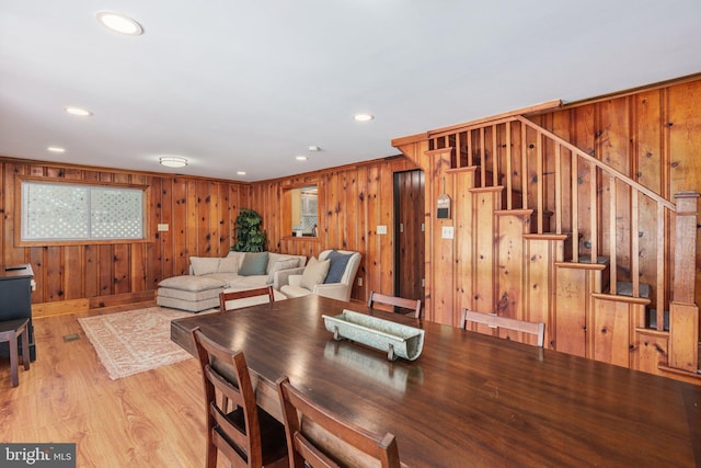 34 S Lake Dr, Lake Harmony, PA 18624 - living room with stairway, recessed lighting, wooden walls, light wood-type flooring, and baseboards