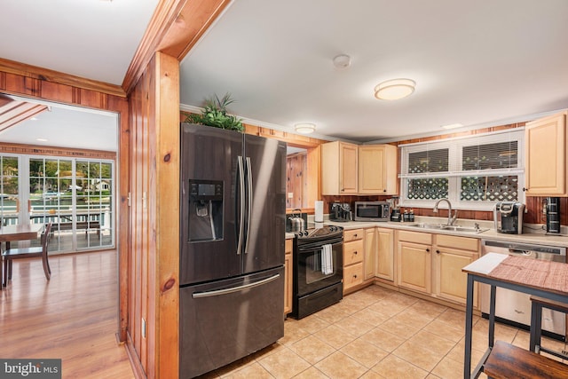 34 S Lake Dr, Lake Harmony, PA 18624 - kitchen with stainless steel appliances, light brown cabinets, a sink, light countertops, and ornamental molding