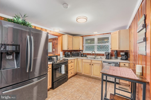 34 S Lake Dr, Lake Harmony, PA 18624 - kitchen with stainless steel appliances, a sink, light brown cabinetry, and light countertops