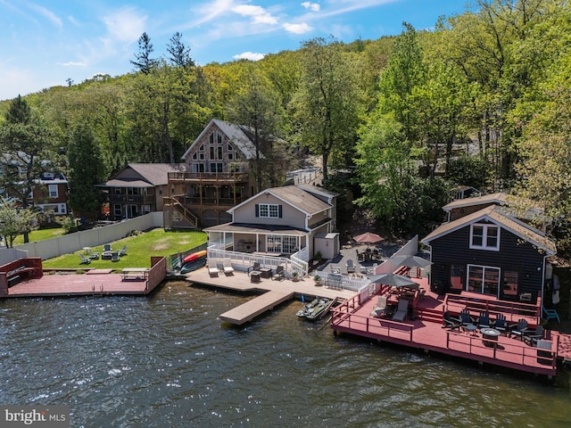 34 S Lake Dr, Lake Harmony, PA 18624 - dock featuring a deck with water view, a forest view, and stairs